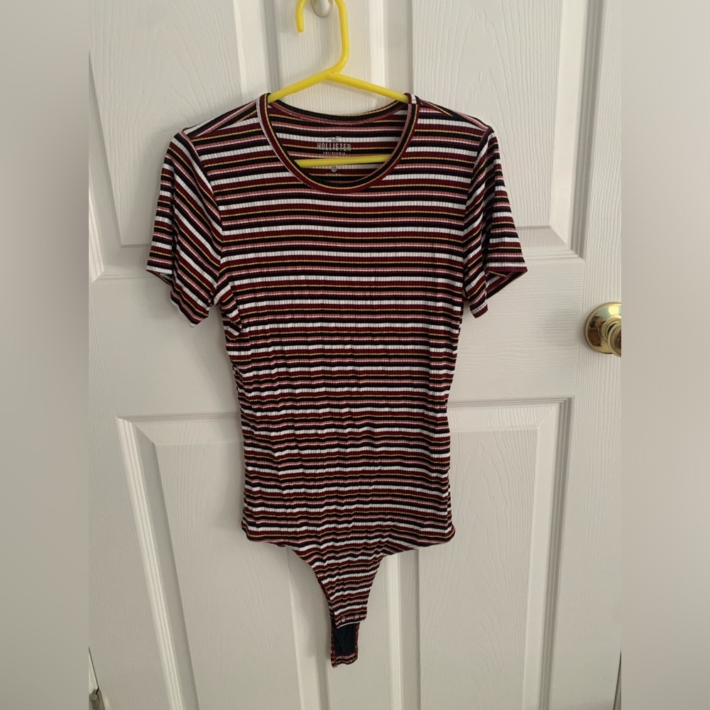 Size medium, striped short sleeve body suit from Hollister.